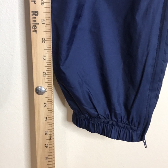Vintage Nike dark blue windbreaker pants with swoosh on front leg size M 8-10 - Picture 7 of 12